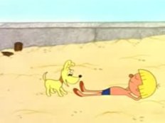 chłopiec z psem na plaży
